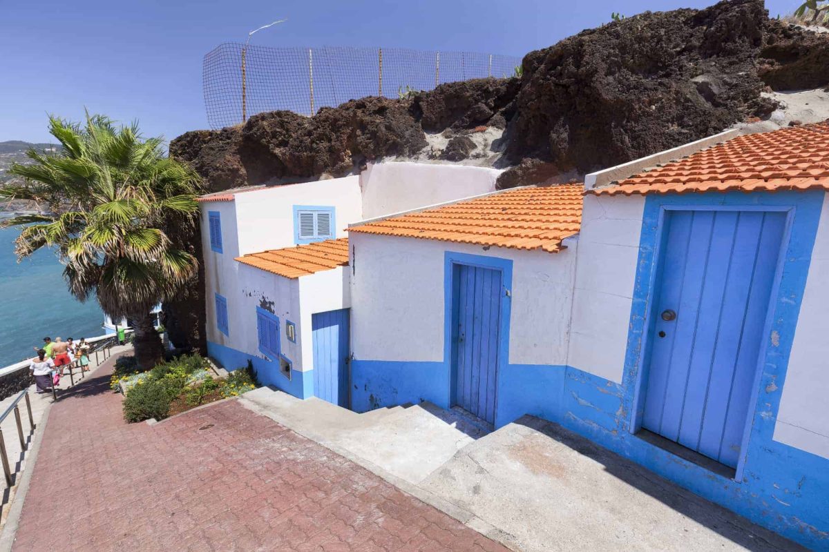 Living in Madeira: Sao Martinho is full of white and blue houses built around volcanic rock.