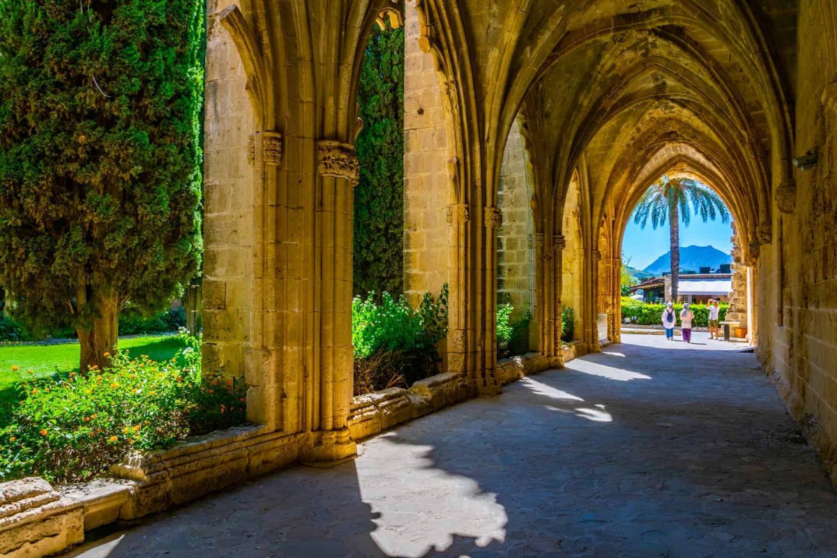 A walk in the shade of the cloisters of Bellapais Abbey 