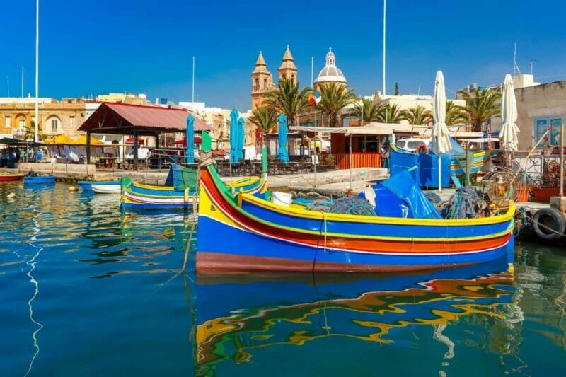 Marsaxlokk, Malta - traditional colorful boats in the harbor