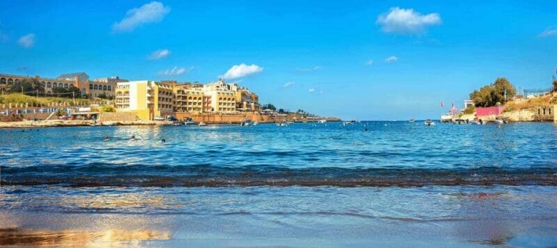 Panoramic view from beach of St. Georges bay. Pembroke, Malta