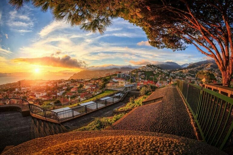 A beautiful sunset over a town on a mountain slope in Portugal