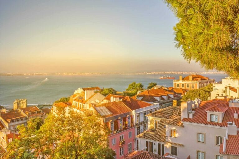 Lisbon town houses sea view, Portugal. Tagus River Panoramic landscape view.