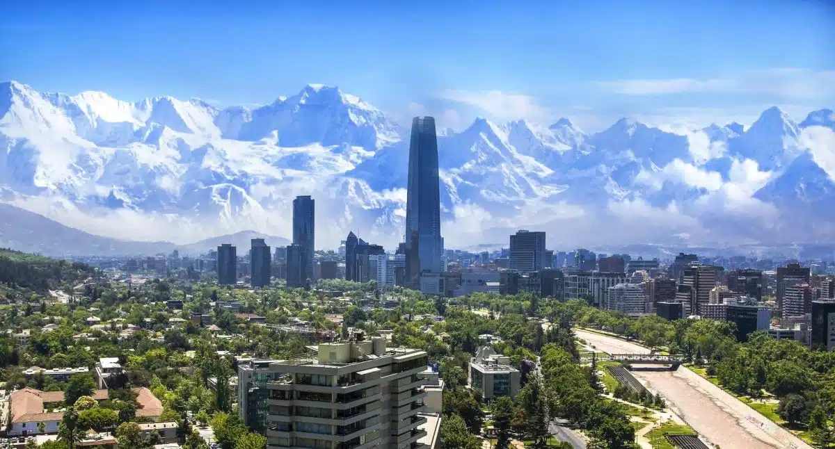 Living in Chile - Santiago cityscape with snowcapped mountains in the bacjground