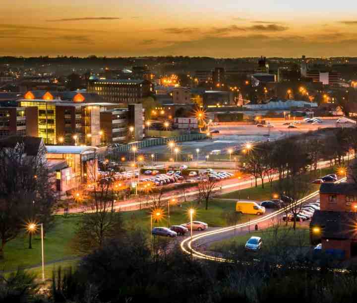 A night view of Norwich, city lights and  traffic.