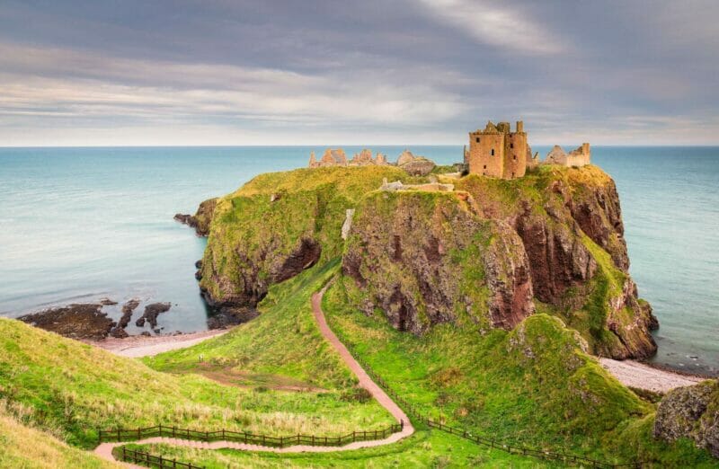 Dunnottar Castle is a ruined medieval fortress located upon a rocky headland on the north east coast of Scotland