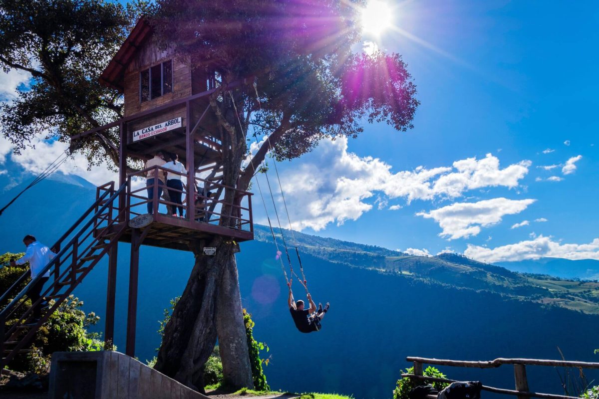 A famous attraction in Ecuador - a swing on the top of the hill in the place called the end of the world
