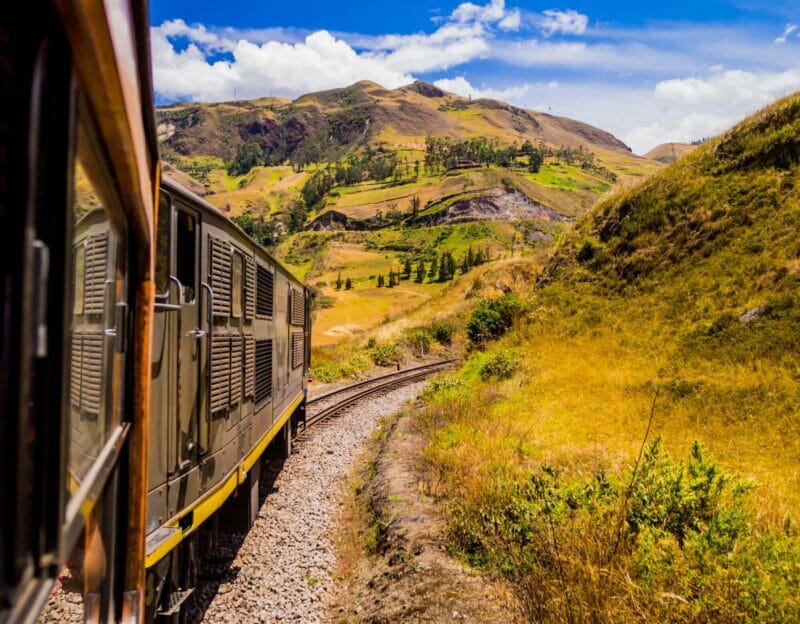 Devil's Nose train running on beautiful Andean landscape, Alausi, Ecuador