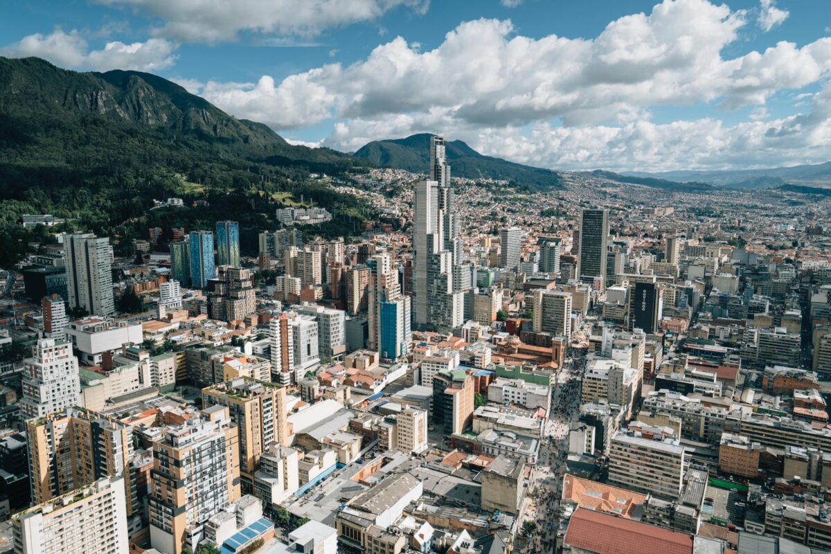 A city scape of Bogota city with mountains in the background