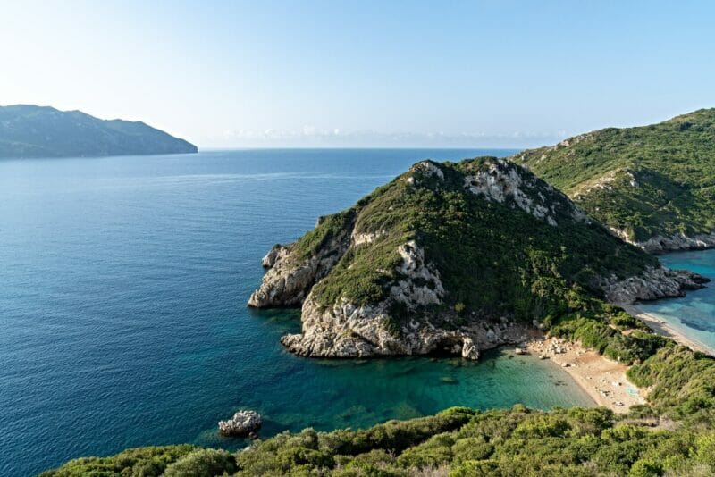A narrow strip of land lined with sandy beaches on both side in Corfu