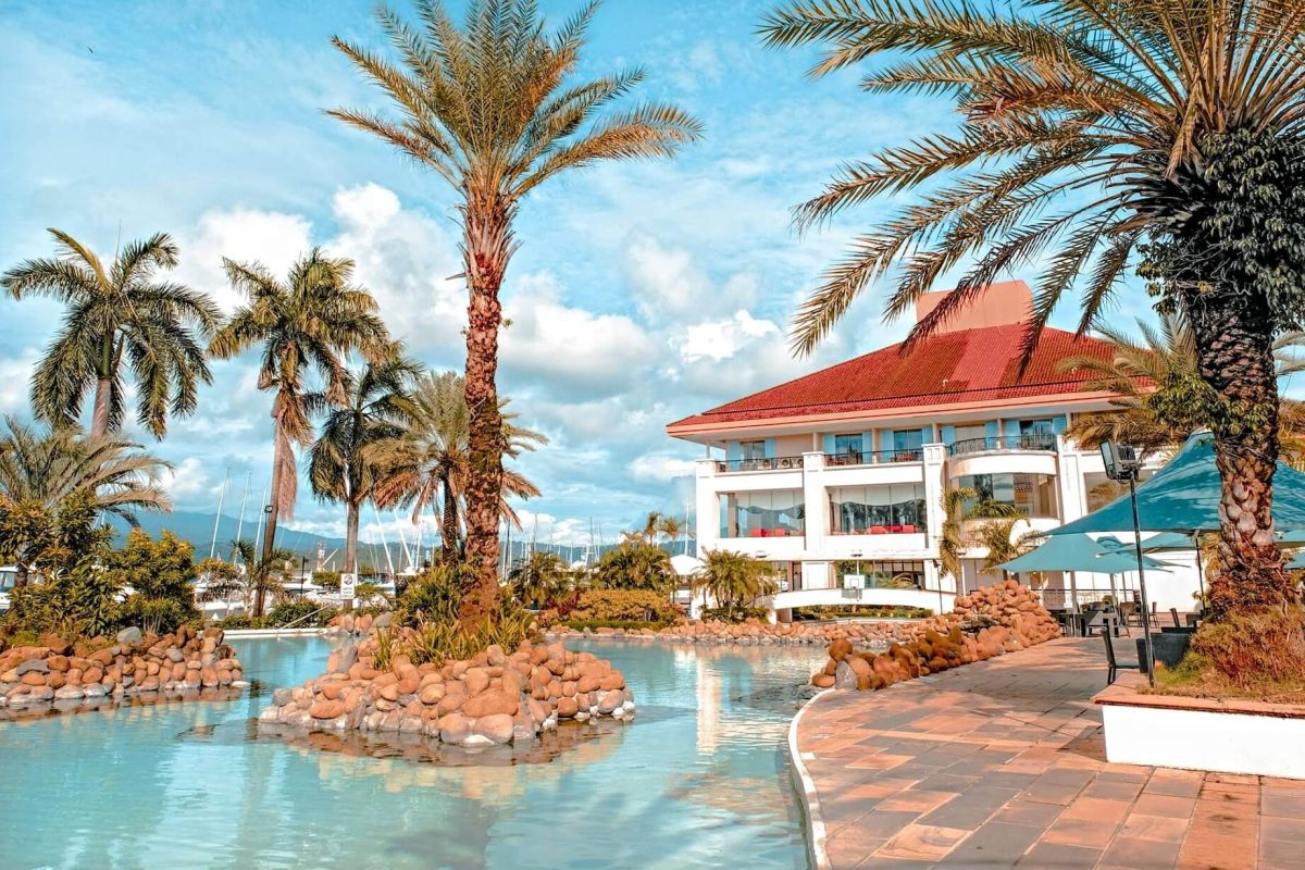 Subic Bay Yacht Club resort with swimming pools and palm trees